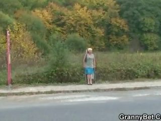 Granny escort is picked up and fucked